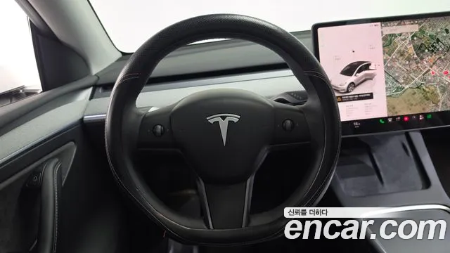 Tesla Model Y — Фото автомобиля 11