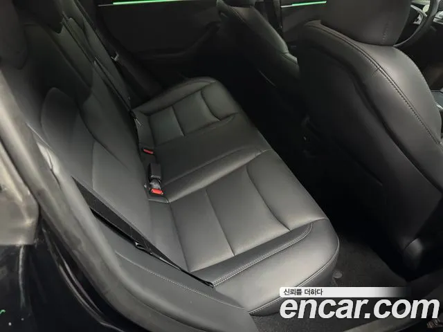 Tesla Model 3 — Фото автомобиля 10