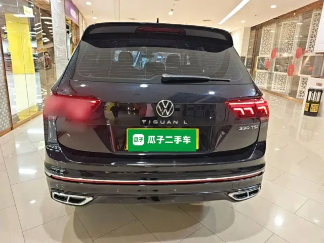 Volkswagen Tiguan L — Фото автомобиля 5
