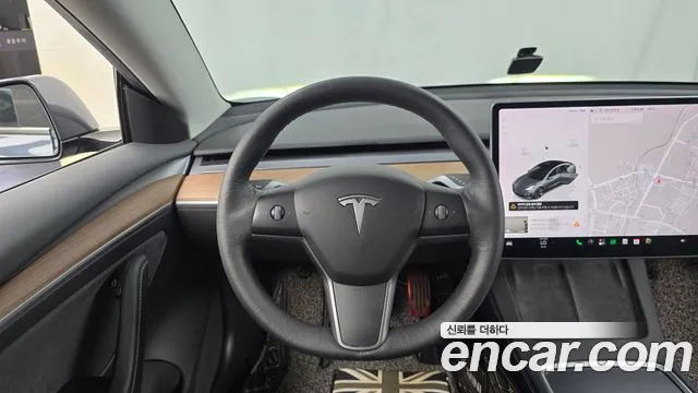 Tesla Model 3 — Фото автомобиля 10
