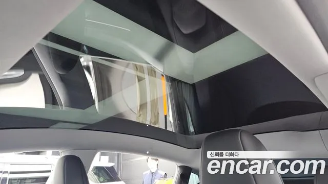 Tesla Model Y — Фото автомобиля 18
