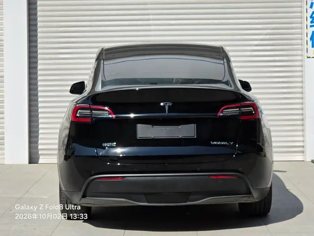 Tesla Model Y — Фото автомобиля 10