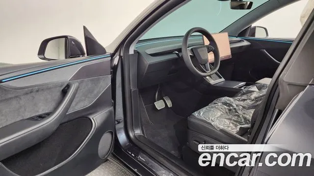 Tesla Model Y — Фото автомобиля 9