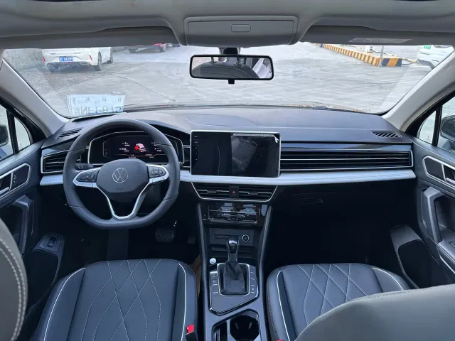 Volkswagen Tiguan L — Фото автомобиля 6