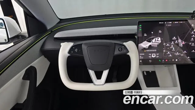Tesla Model Y — Фото автомобиля 14