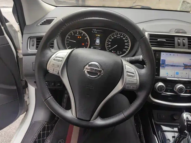 Nissan Tiida — Фото автомобиля 15