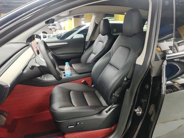 Tesla Model Y — Фото автомобиля 14