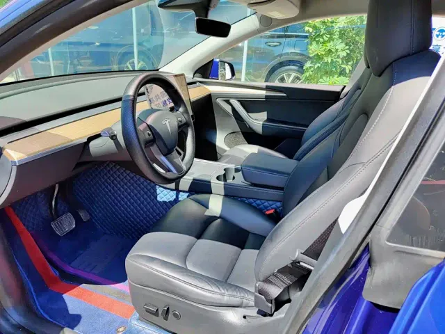Tesla Model Y — Фото автомобиля 7