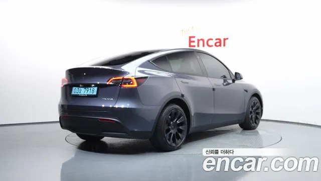 Tesla Model Y — Фото автомобиля 2