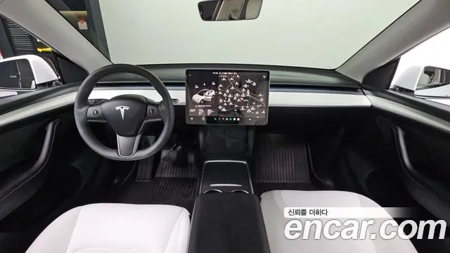 Tesla Model Y — Фото автомобиля 6