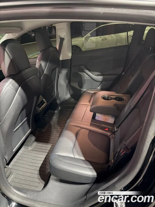Tesla Model Y — Фото автомобиля 7