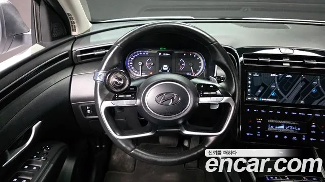 Hyundai Tucson Tucson (NX4) Бензин 1.6 турбо 2WD — Фото автомобиля 12