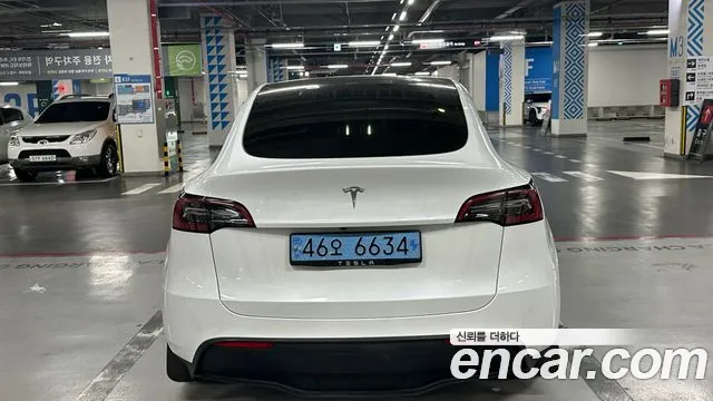 Tesla Model Y — Фото автомобиля 4