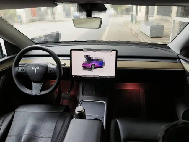 Tesla Model Y — Фото автомобиля 12