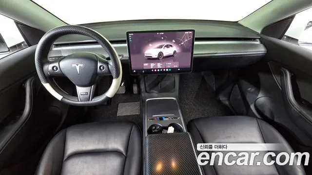 Tesla Model Y — Фото автомобиля 7