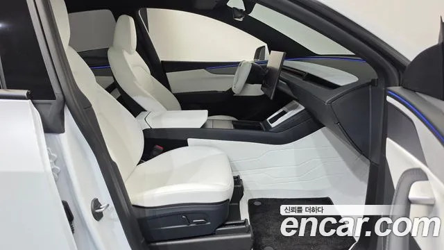 Tesla Model Y — Фото автомобиля 25