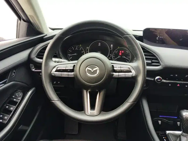 Mazda Axela — Фото автомобиля 15