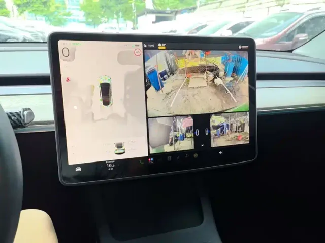 Tesla Model Y — Фото автомобиля 12