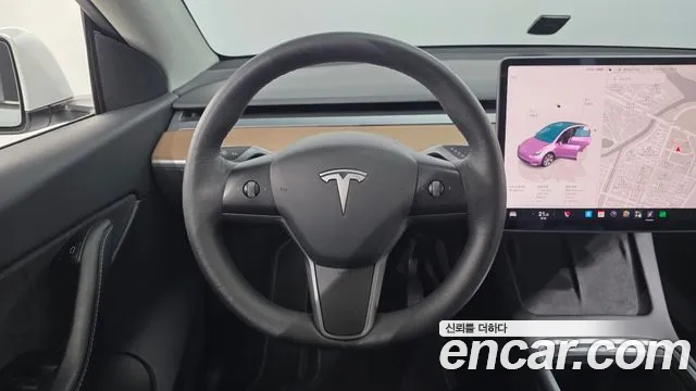 Tesla Model Y — Фото автомобиля 13