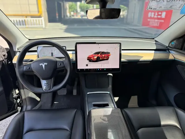 Tesla Model Y — Фото автомобиля 6