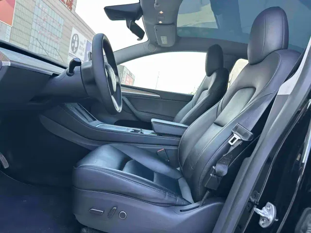 Tesla Model Y — Фото автомобиля 4