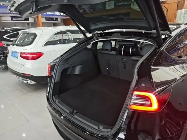 Tesla Model Y — Фото автомобиля 18