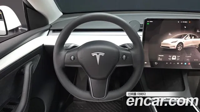 Tesla Model Y — Фото автомобиля 13