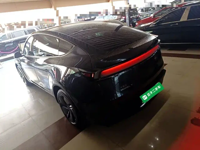 Tesla Model Y — Фото автомобиля 4