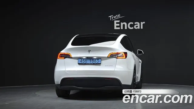 Tesla Model Y — Фото автомобиля 4