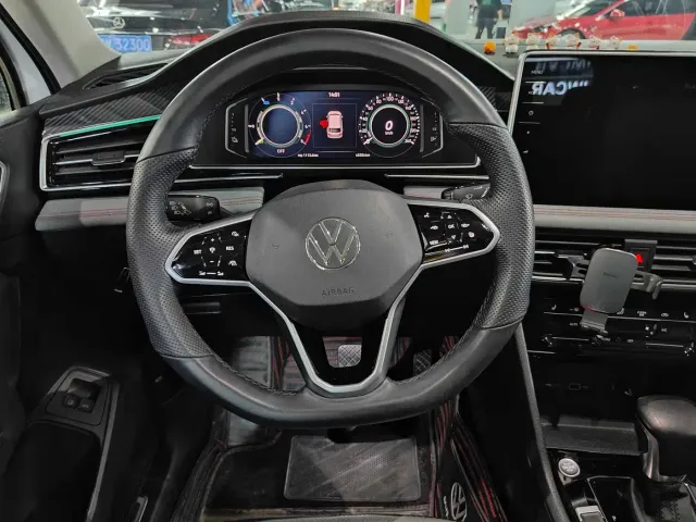 Volkswagen Tiguan L PHEV — Фото автомобиля 6