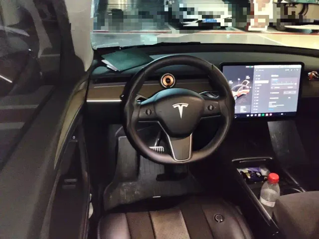 Tesla Model Y — Фото автомобиля 11