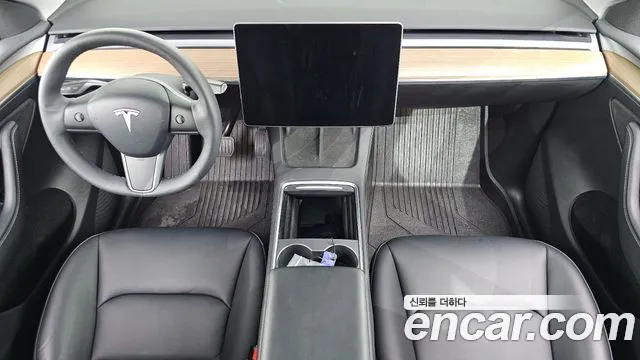 Tesla Model Y — Фото автомобиля 10