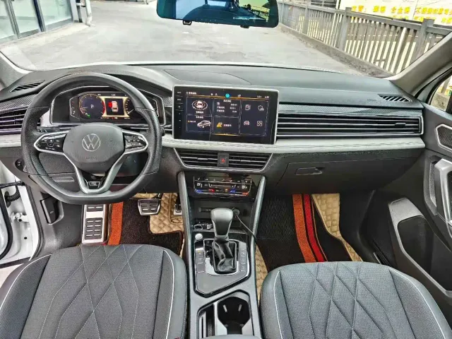 Volkswagen Tiguan L — Фото автомобиля 8