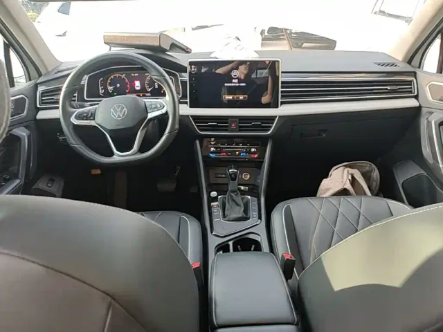 Volkswagen Tiguan L — Фото автомобиля 9