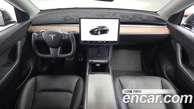 Tesla Model Y — Фото автомобиля 6
