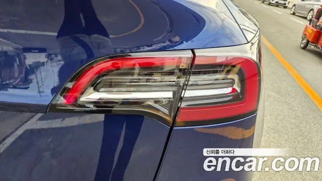 Tesla Model Y — Фото автомобиля 5