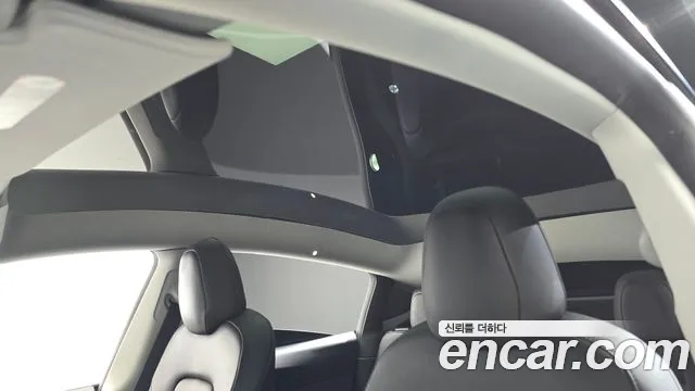 Tesla Model Y — Фото автомобиля 16