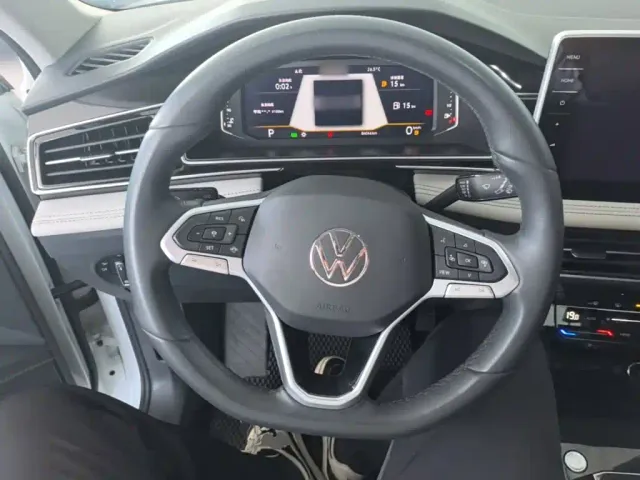 Volkswagen Tiguan L — Фото автомобиля 10