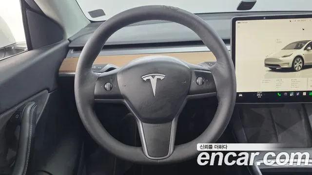 Tesla Model Y — Фото автомобиля 13