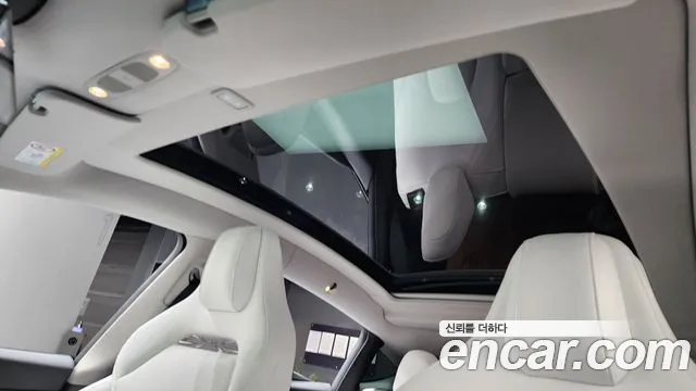 Tesla Model Y — Фото автомобиля 18