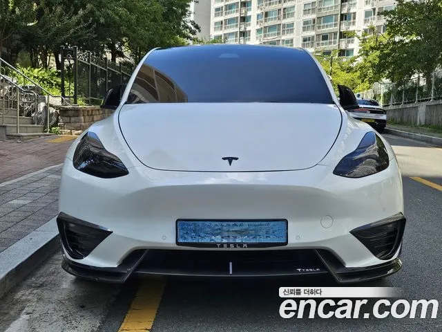 Tesla Model Y — Фото автомобиля 3