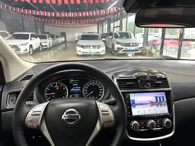 Nissan Tiida — Фото автомобиля 14