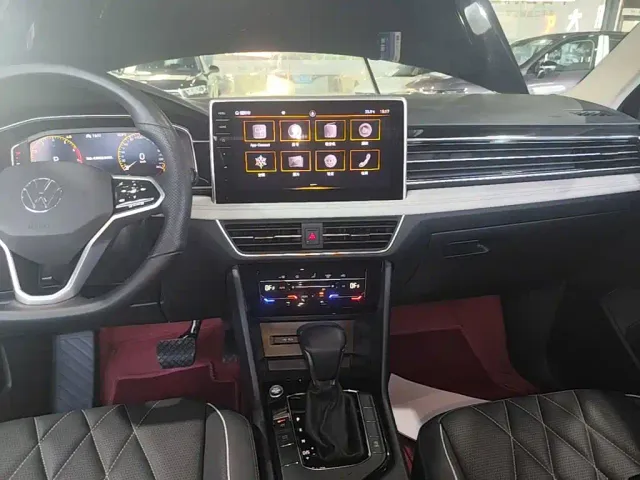 Volkswagen Tiguan L — Фото автомобиля 12