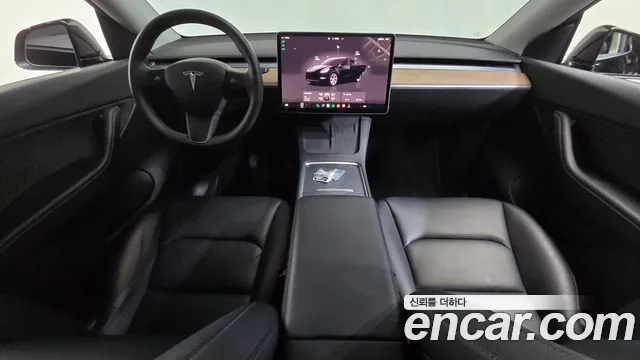 Tesla Model Y — Фото автомобиля 10