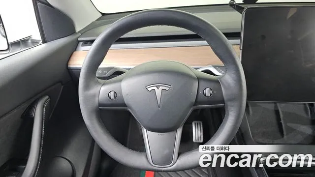 Tesla Model Y — Фото автомобиля 14
