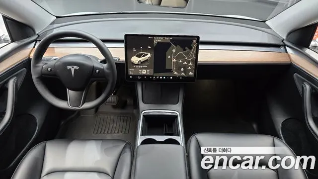Tesla Model Y — Фото автомобиля 7