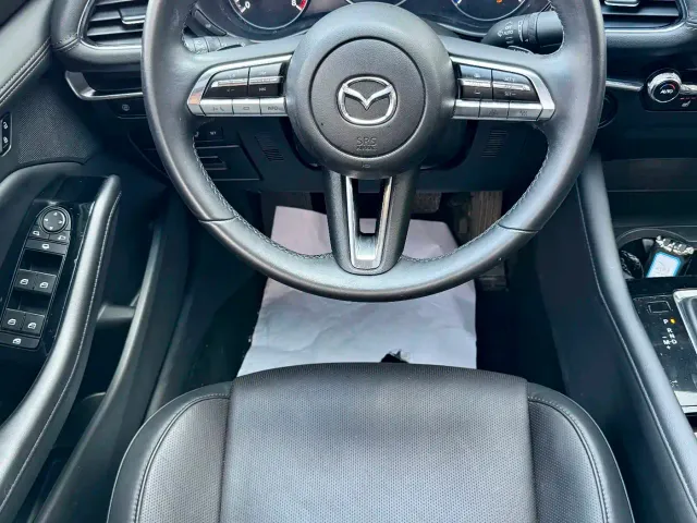 Mazda Axela — Фото автомобиля 19