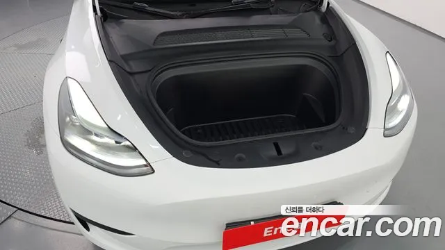 Tesla Model Y — Фото автомобиля 6