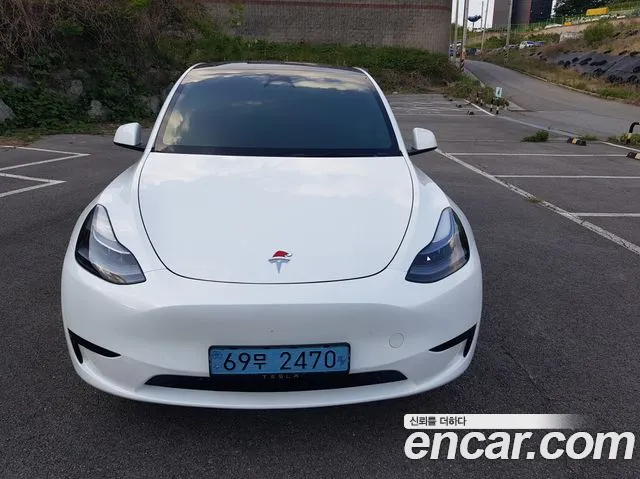 Tesla Model Y — Фото автомобиля 3