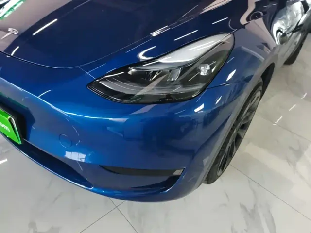 Tesla Model Y — Фото автомобиля 23